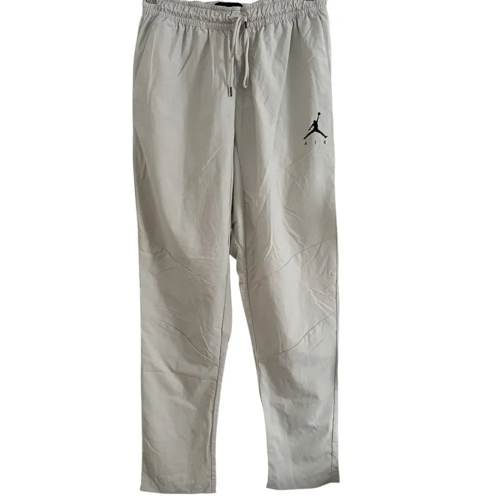 Jordan Cream Sweatpants with Jumpman Logo and Elastic Waistband